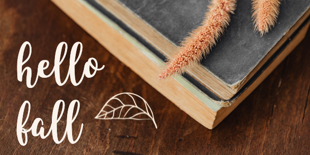 Two Books on Wooden Background with Leaf and Hello Fall Text