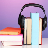 Stack of books and headphones