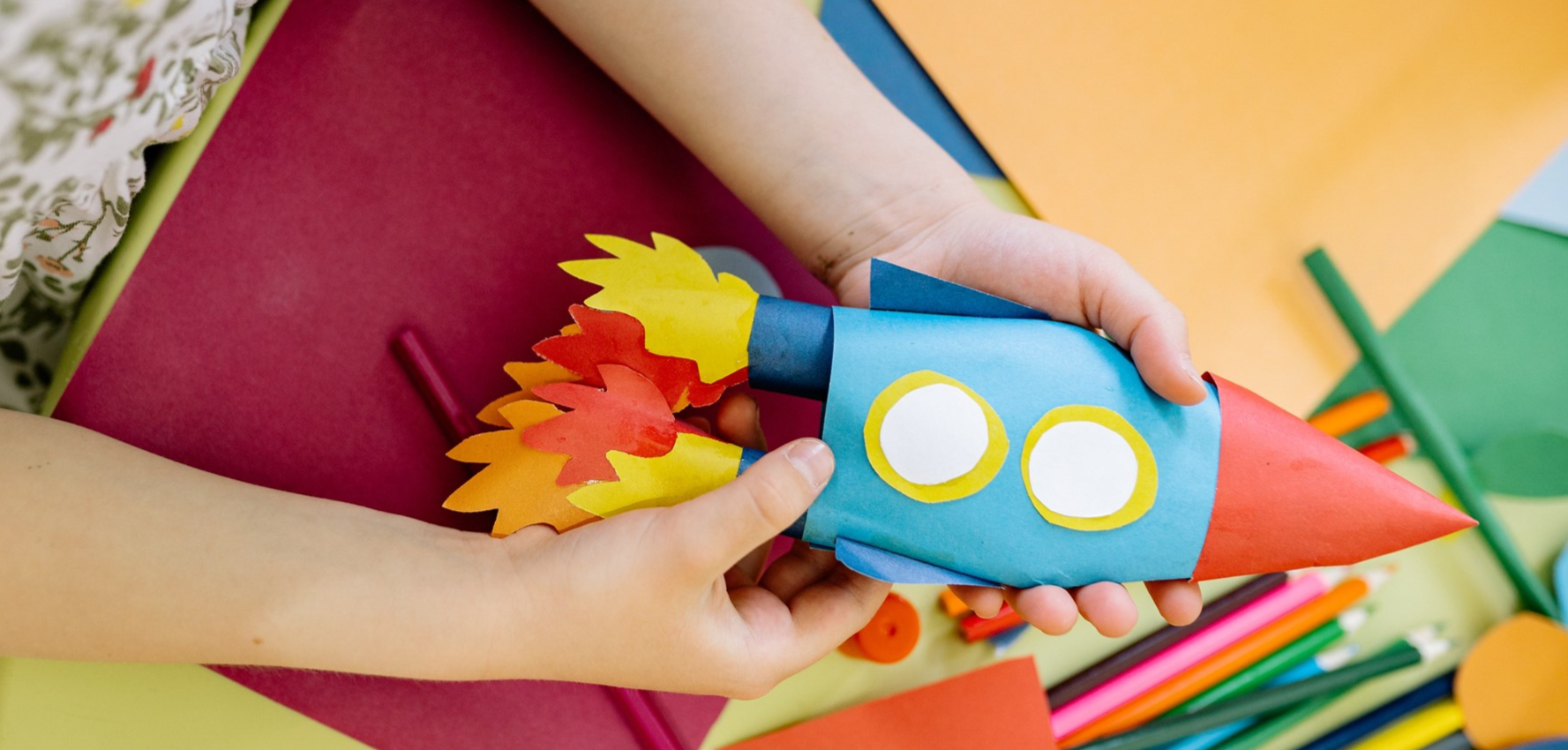 Child Creating a Space Rocket Craft