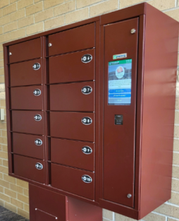 A bank of 10 lockers and kiosk for picking up library materials.