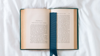 Open Book on White Background